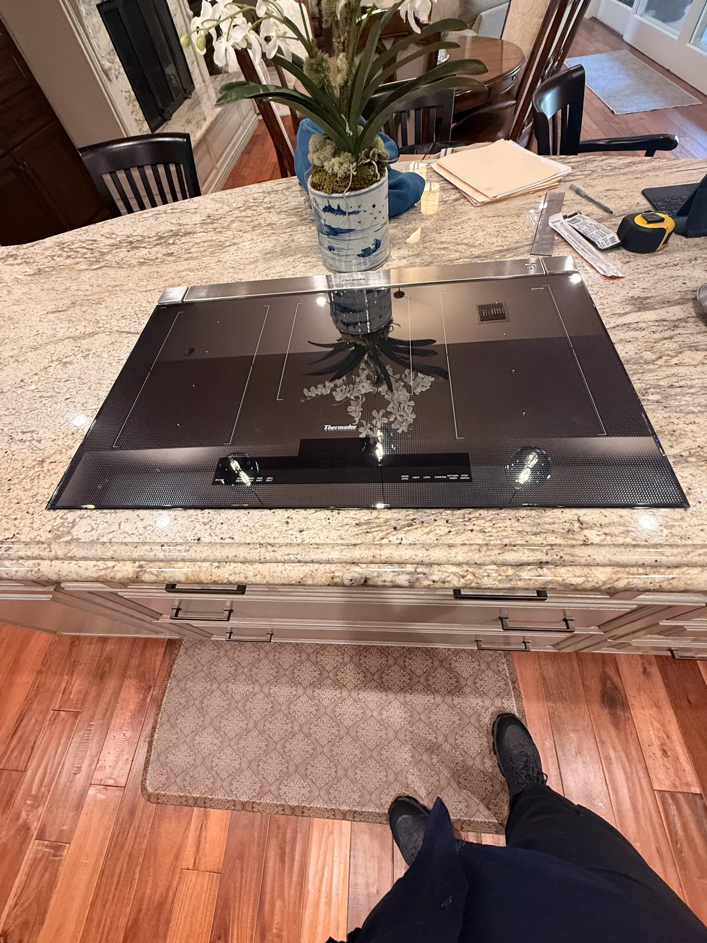 A Thermador cooktop in a marble island